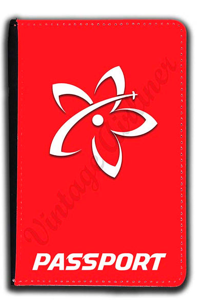 Mokulele logo bug in white passport holder