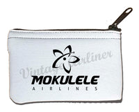 Mokulele logo stacked in black rectangular coin purse